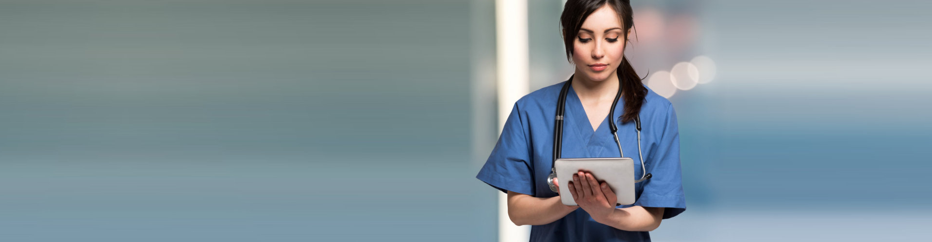 nurse browsing on her tablet